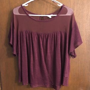Maroon top.